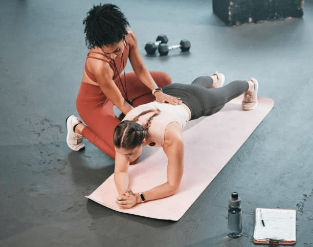 Women Help to Other Doing Push Ups